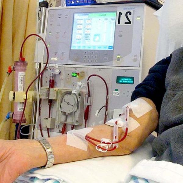 A patient receiving dialysis treatment